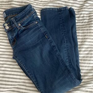 Hudson, medium wash jeans.